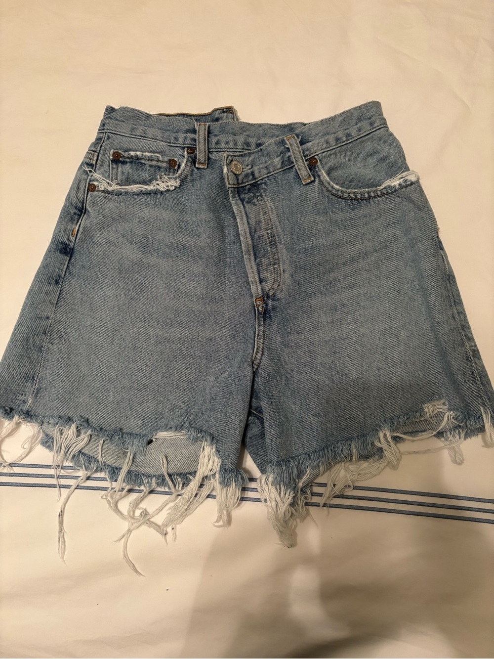 Agolde Criss cross denim shorts in Symbol
